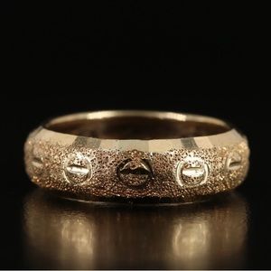 14k solid gold domed band. Size 7. .